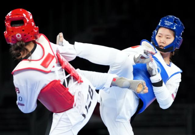 张梦宇无缘奖牌 三年后能否让金牌项目重现荣耀？